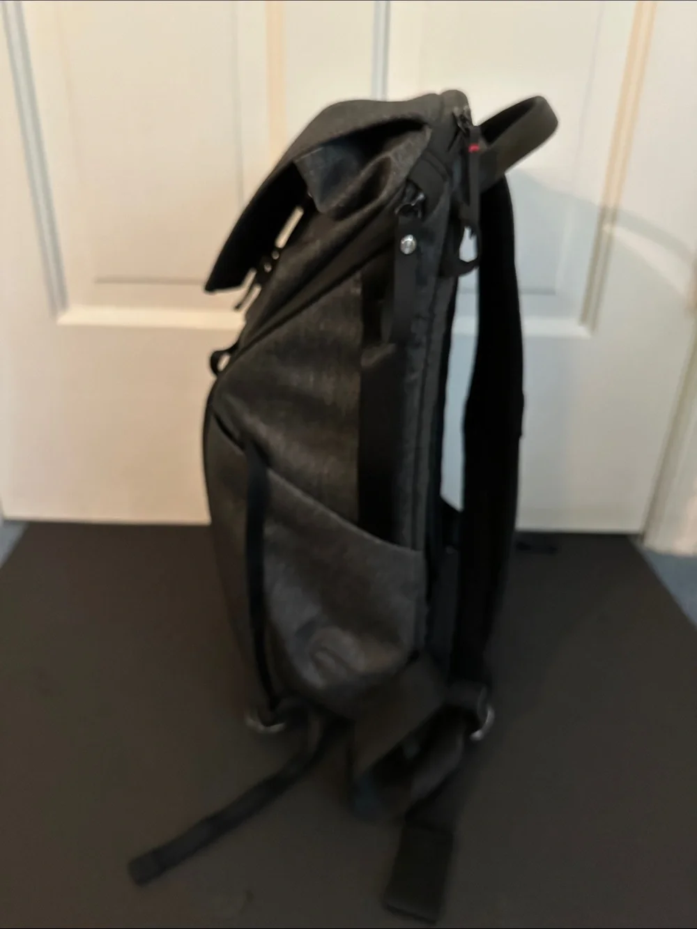 Peak Design Dark Gray Everyday Backpack with Red Accent.